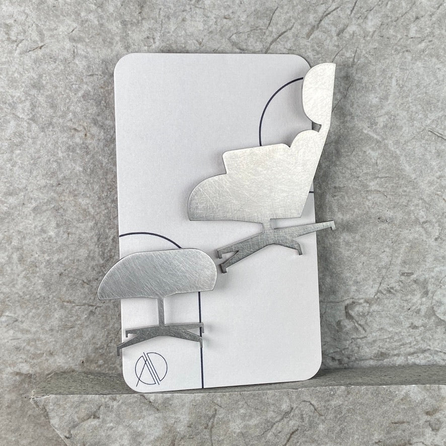 eames chair and ottoman brooch set