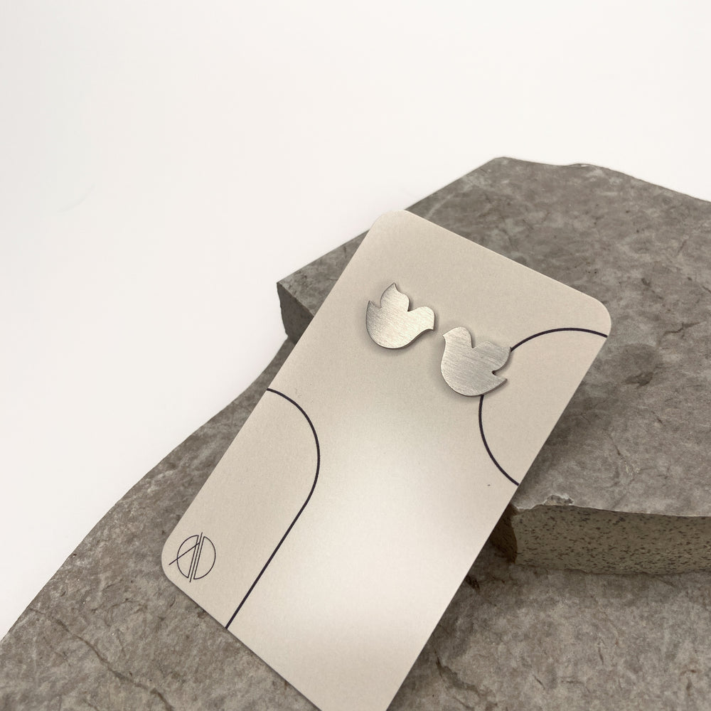 
                  
                    birdie earrings
                  
                