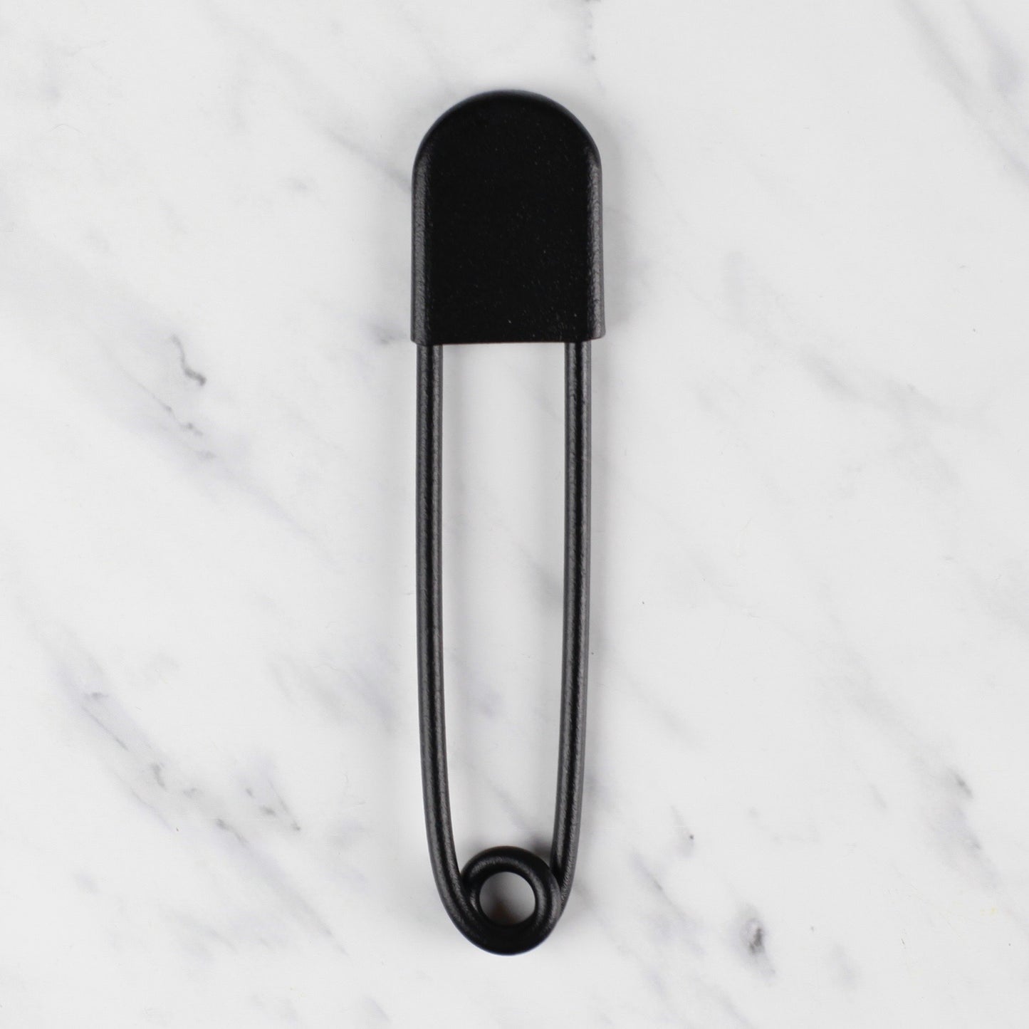 
                  
                    giant safety pin - textured matte black
                  
                