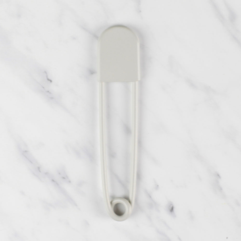 
                  
                    giant safety pin - offwhite
                  
                