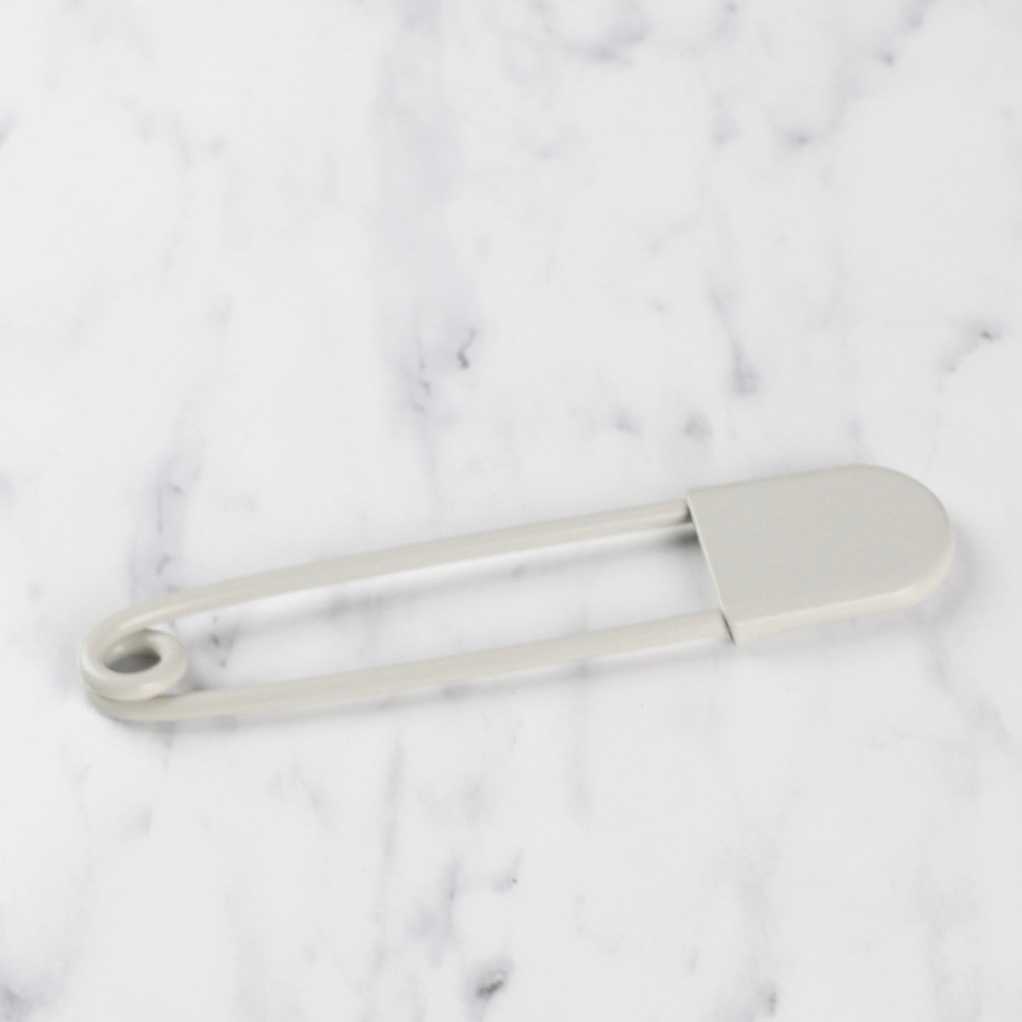 
                  
                    giant safety pin - offwhite
                  
                
