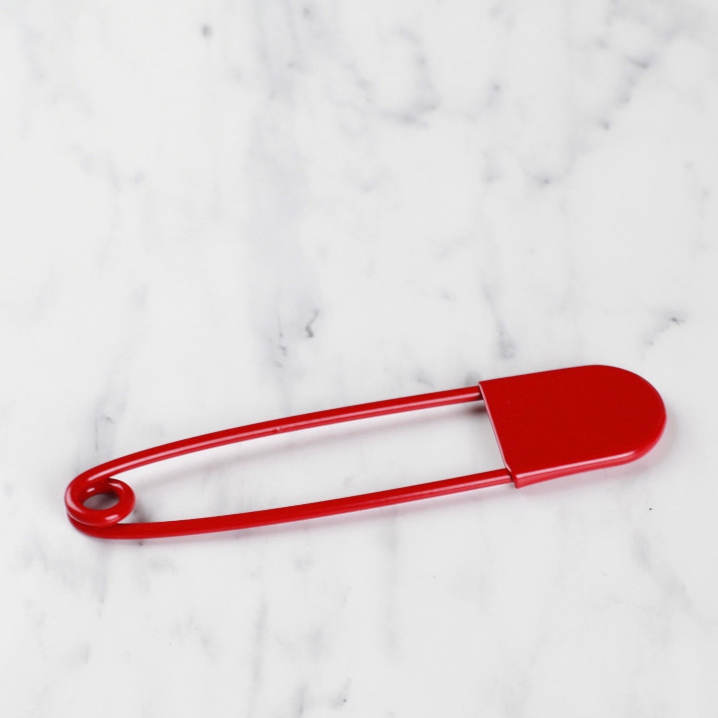 
                  
                    giant safety pin - red
                  
                